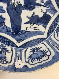 A Chinese blue and white 'kraak' dish with Damo in a landscape, Wanli