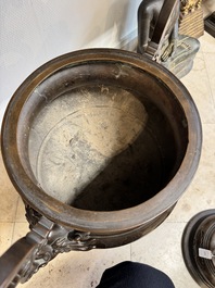 A massive Vietnamese copper- and silver-inlaid 'Buddhist lion' censer and cover on stand, 19th C.