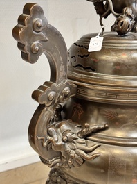 A massive Vietnamese copper- and silver-inlaid 'Buddhist lion' censer and cover on stand, 19th C.