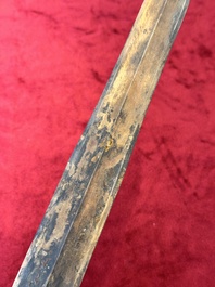 A rare Chinese turquoise-inlaid parcel-gilt bronze sword, Zhou