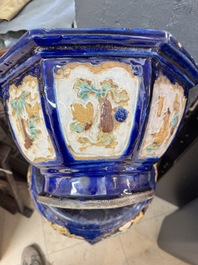 A Chinese or Vietnamese polychrome-glaze pottery jardini&egrave;re and stand, 19th C.
