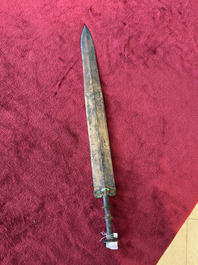 A rare Chinese turquoise-inlaid parcel-gilt bronze sword, Zhou