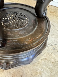 A massive Vietnamese copper- and silver-inlaid 'Buddhist lion' censer and cover on stand, 19th C.
