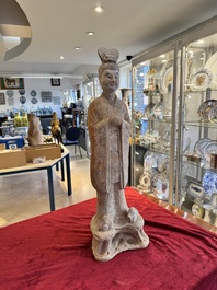 A large Chinese painted pottery figure of a civil official, Tang