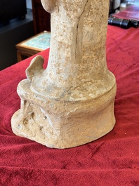 A large Chinese painted pottery figure of a civil official, Tang