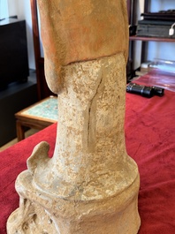 A large Chinese painted pottery figure of a civil official, Tang