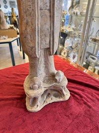 A large Chinese painted pottery figure of a civil official, Tang