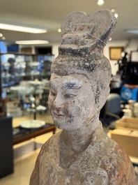 A large Chinese painted pottery figure of a civil official, Tang