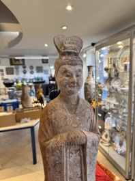 A large Chinese painted pottery figure of a civil official, Tang