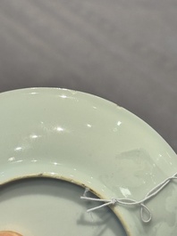 A Chinese famille verte 'erotic' cup and saucer, lingzhi mark, Kangxi