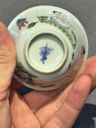 A Chinese famille verte 'erotic' cup and saucer, lingzhi mark, Kangxi
