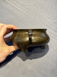 A Chinese bronze tripod censer, Jia Cang Zhen Bao 家藏珍寶 mark, 18th C.