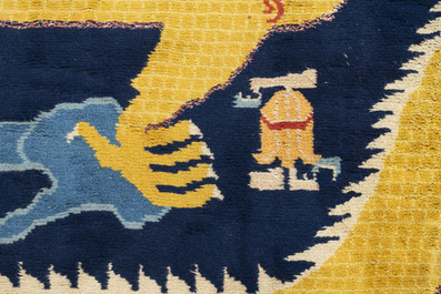 A Sino-Tibetan inscribed woollen 'dragon' pillar carpet, 19th C.
