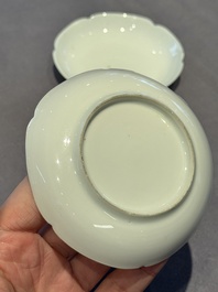 A pair of Chinese eggshell white-glazed cups and saucers, and two famille rose cups, 18th C.