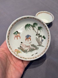 A Chinese famille verte 'erotic' cup and saucer, lingzhi mark, Kangxi