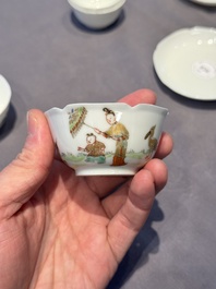 A pair of Chinese eggshell white-glazed cups and saucers, and two famille rose cups, 18th C.