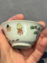 A Chinese famille verte 'erotic' cup and saucer, lingzhi mark, Kangxi