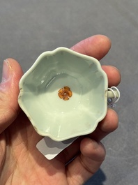 Two small Chinese famille verte handled cups with 'prunus on cracked ice' and 'shou' design, Kangxi