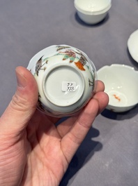 A pair of Chinese eggshell white-glazed cups and saucers, and two famille rose cups, 18th C.