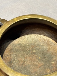 A Chinese bronze tripod censer, Jia Cang Zhen Bao 家藏珍寶 mark, 18th C.