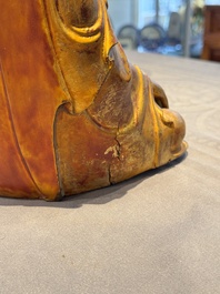 A Chinese gilt-lacquered wooden sculpture of Buddha, Ming