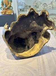 A rare Chinese bronze group depicting two immortals and various animals in a mountainous landscape, Ming