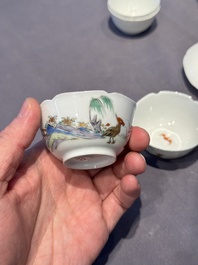 A pair of Chinese eggshell white-glazed cups and saucers, and two famille rose cups, 18th C.