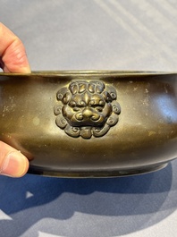 A Chinese bronze censer with lion-form handles, 大明宣德五年監造工部官監吳邦佐造 mark, 18th C.