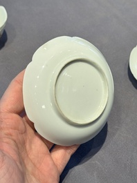 A pair of Chinese eggshell white-glazed cups and saucers, and two famille rose cups, 18th C.