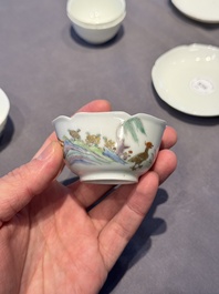 A pair of Chinese eggshell white-glazed cups and saucers, and two famille rose cups, 18th C.