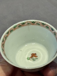 A Chinese famille verte 'erotic' cup and saucer, lingzhi mark, Kangxi