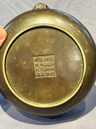 A Chinese bronze censer with lion-form handles, 大明宣德五年監造工部官監吳邦佐造 mark, 18th C.