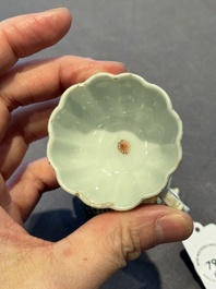 Two small Chinese famille verte handled cups with 'prunus on cracked ice' and 'shou' design, Kangxi