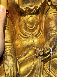 A Chinese gilt-lacquered wooden sculpture of Buddha, Ming