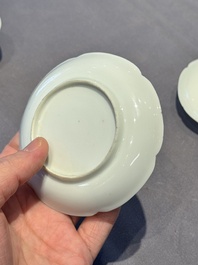 A pair of Chinese eggshell white-glazed cups and saucers, and two famille rose cups, 18th C.