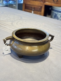 A Chinese bronze tripod censer, Jia Cang Zhen Bao 家藏珍寶 mark, 18th C.
