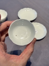 A pair of Chinese eggshell white-glazed cups and saucers, and two famille rose cups, 18th C.