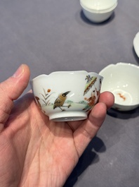 A pair of Chinese eggshell white-glazed cups and saucers, and two famille rose cups, 18th C.