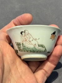 A Chinese famille verte 'erotic' cup and saucer, lingzhi mark, Kangxi