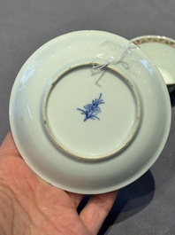 A Chinese famille verte 'erotic' cup and saucer, lingzhi mark, Kangxi