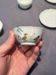 A pair of Chinese eggshell white-glazed cups and saucers, and two famille rose cups, 18th C.