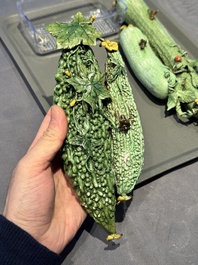 Two Chinese polychrome groups of cucumbers and bitter melons with insects, 19/20th C.