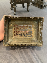 A large Vietnamese copper- and silver-inlaid rectangular 'Buddhist lion' censer and cover on stand, 19th C.