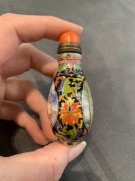 A collection of ten Chinese Canton enamel and porcelain snuff bottles, Qianlong mark, 19/20th C.