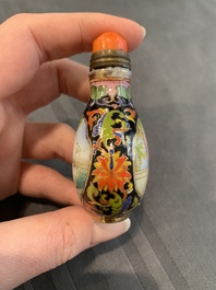 A collection of ten Chinese Canton enamel and porcelain snuff bottles, Qianlong mark, 19/20th C.