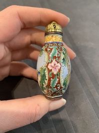 A collection of ten Chinese Canton enamel and porcelain snuff bottles, Qianlong mark, 19/20th C.