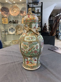 A Chinese Canton famille rose covered vase and two bowls, 19th C.