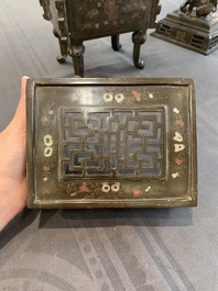 A large Vietnamese copper- and silver-inlaid rectangular 'Buddhist lion' censer and cover on stand, 19th C.