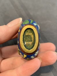 A collection of ten Chinese Canton enamel and porcelain snuff bottles, Qianlong mark, 19/20th C.