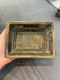 A large Vietnamese copper- and silver-inlaid rectangular 'Buddhist lion' censer and cover on stand, 19th C.